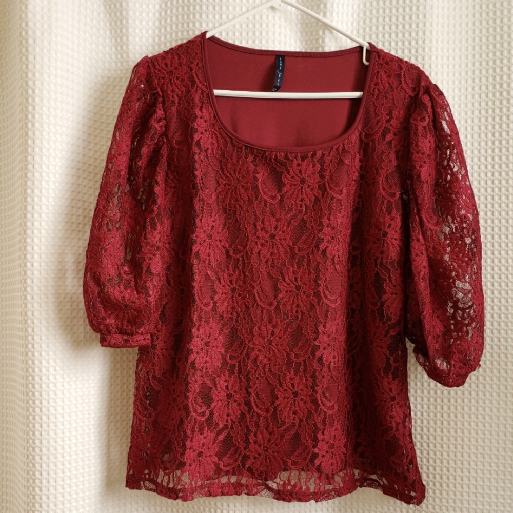 Dressy lace overlay top.